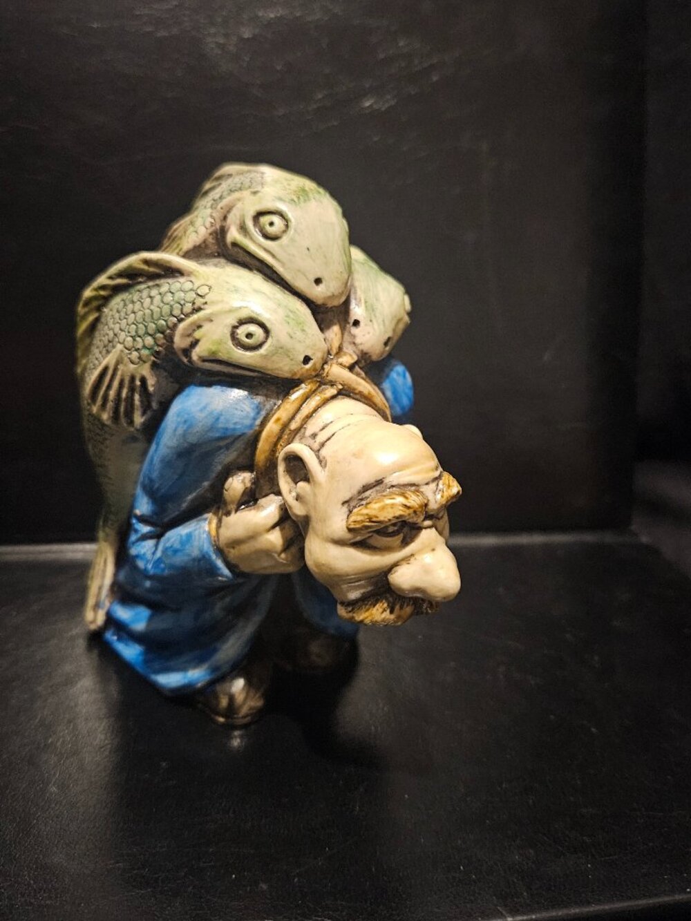 Whimsical Man with Three Fish from Christine Clarke's Kirkwall Orkney Scotland